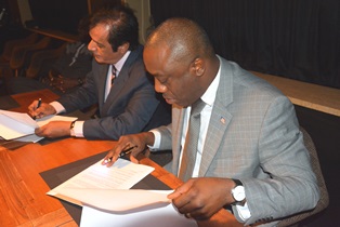 Acting Minster of Finance and Development Planning Hon. Alvin E. Attah and SFD Signed Aide Memoire for Gbarnga Salayea Konia Road project