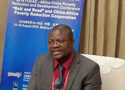 Deputy Minister for Economic Management Hon Augustine Flomo speaking at Africa China Poverty Reduction and Development Conference in Beijing China 