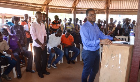 Executive Director of LIMAPC making a remark at the University of Liberia main campus